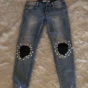Detailed:Pearls and overlay jeans